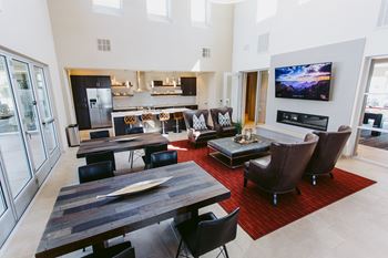Social room with kitchen and fireplace